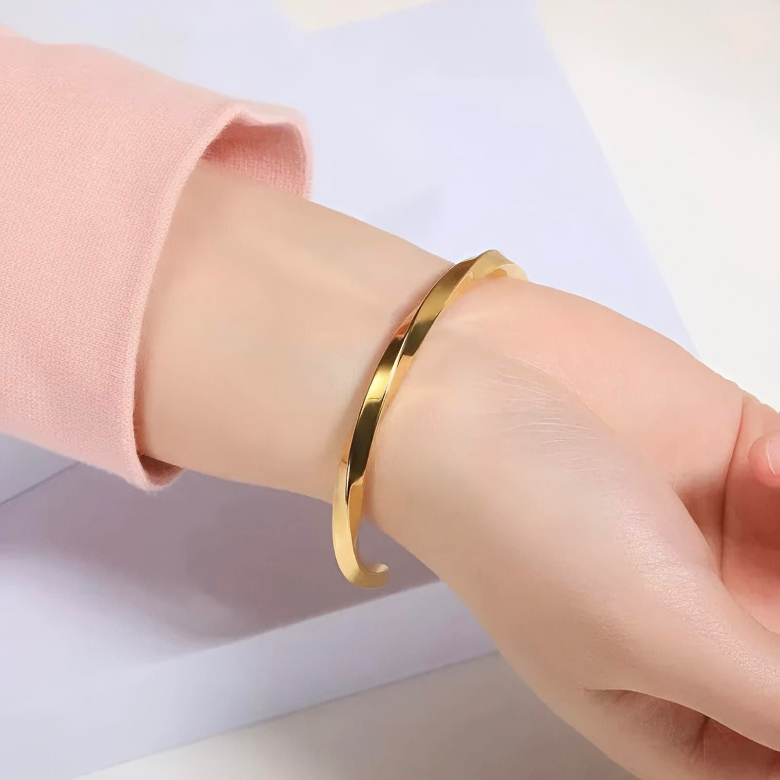 Bracelet torsadé doré femme